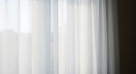 Delicate white sheer curtains gently filter sunlight, creating soft shadows.