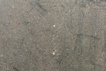 Close-up photograph of a gray, textured surface. Classic, elegant and charming textured background...