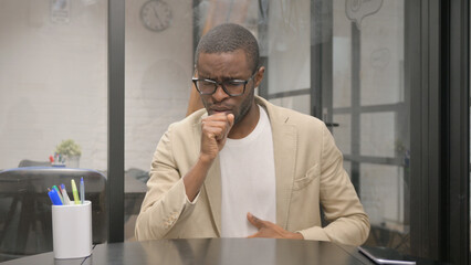 Naklejka premium Portrait of Coughing African Man Feeling Unwell