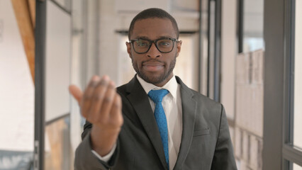 Portrait of Confident African Businessman Inviting People