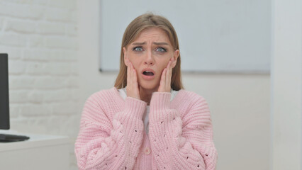 Portrait of Surprised Creative Young Woman Enjoying Win