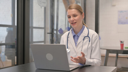 Young Doctor Talking with Patient on Video Chat