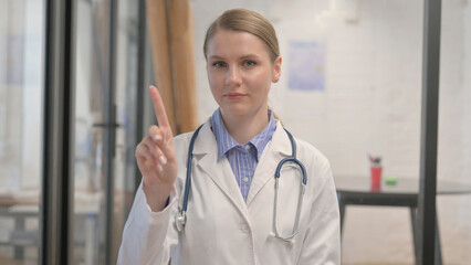 Portrait of Stopping Young Female Doctor in Denial
