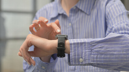 Close up of Woman Using Smart Watch