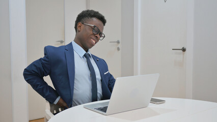 Fototapeta premium African Businessman Suffering from Back Pain