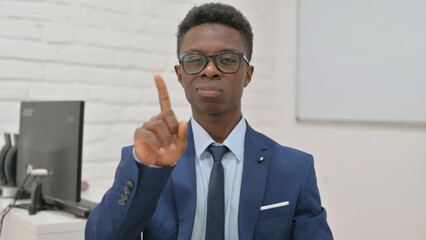 Young Businessman Showing No Gesture with Finger