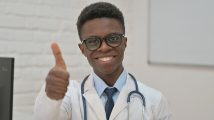 Confident African American Doctor Giving Thumbs Up