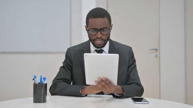 Businessman Talking for Video Call on a Tablet