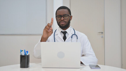 Doctor Making a No Gesture During Looking at Camera