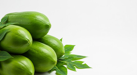 Fresh Green Papayas with Leaves on White Background – Raw Tropical Fruit