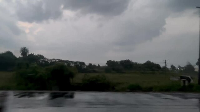 Wet Highway After Rain Captured While Traveling by Car.