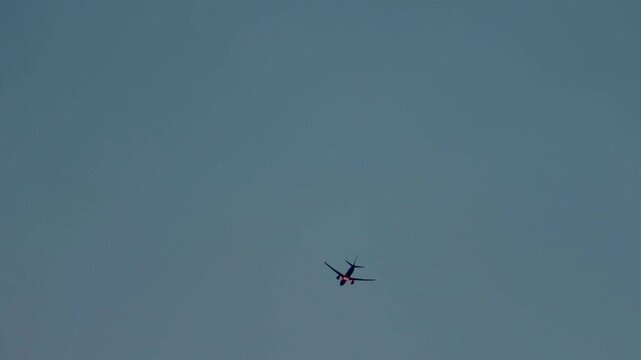  Low-Angle Video of Flight Crossing Atmospheric Clouds From Below.