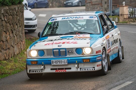 BMW M3 E30 rally car competing in the PRE90 category at the 73rd KH7 Costa Brava Rally