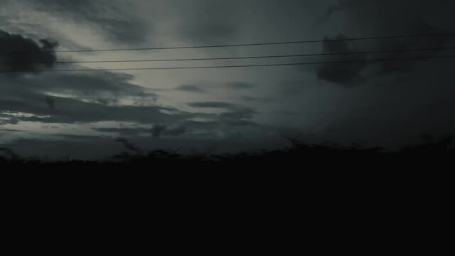  Rotating Wind Turbine Captured From Bus While Travelling