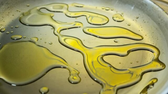 Artistic Patterns of Oil in a Pan - Cooking Concept for Culinary and Design Use