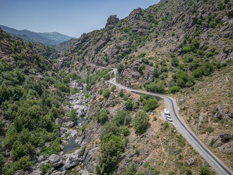 Camping Caravan driving through Canyon de la Ruda road Corsica down the pass monte Cino