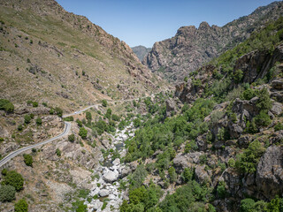 Camping Caravan driving through Canyon de la Ruda road Corsica down the pass monte Cino