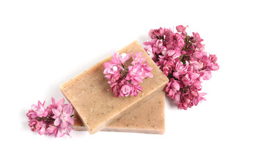 Soap bars and lilac flowers isolated white