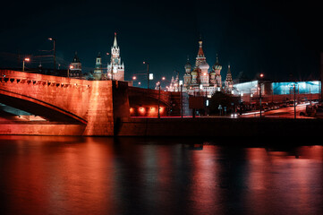 Beautiful city landscape at night. The Moscow River and Kremlin buildings.