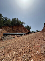 mountain construction drone view coniferous forest 4k. construction of gas pipelines in the...