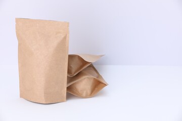 Zipper stand-up pouches on white background. Mockup for design