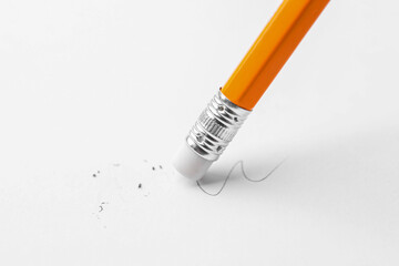 Using pencil with eraser on white background, closeup