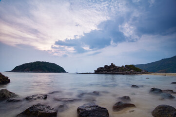 Scenic Coastal Landscape at Sunset with Calm Ocean and Vibrant Sky