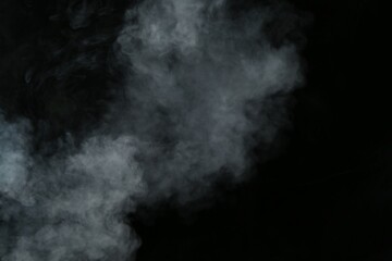 Beautiful hookah smoke on black background, closeup