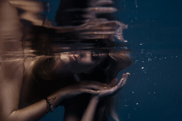 Artistic Underwater Portrait Reflecting Serenity and Grace