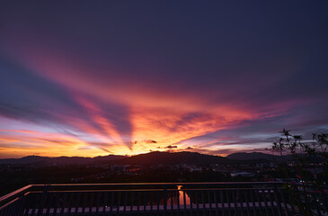 Dramatic Sunset Over a Scenic Mountain Landscape With Vibrant Sky Colors
