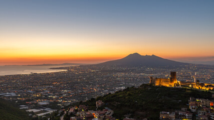 Lettere Castle seen from afar with Vesuvius and the city of Naples in the background. Italy