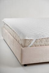 Soft bed with cushioned mattress topper adds comfort and relaxation. For improving bedding quality...