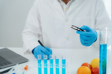 Scientist check chemical whole grains residues in laboratory. Control experts inspect the...