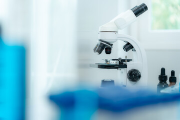 Scientist analyze biochemical samples in advanced scientific laboratory. Medical professional use...