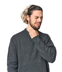 Young Caucasian man in studio setting suffers pain in throat due a virus or infection.