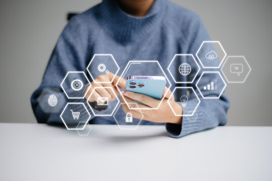 Businesswoman hand working digital marketing media in virtual screen with mobile phone and modern compute