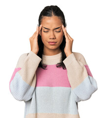 Young Filipina woman touching temples and having headache.