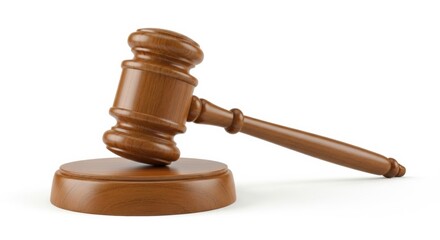 A wooden mallet or gavel on its matching sound block, isolated on a white studio background. Used by a judge for order in a courtroom or by an auctioneer.