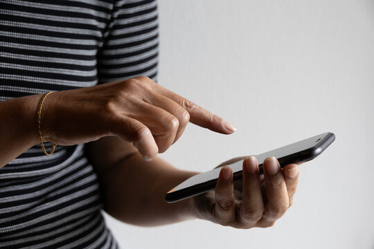 woman using a smartphone business communication, secure internet banking intuitive touch interactions modern mobile technology lifestyle data access connection digital interfaces