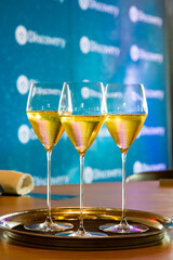 Set of white wine glasses on a table
