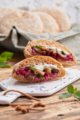 Stuffed pita with mushrooms, red cabbage and yogurt
