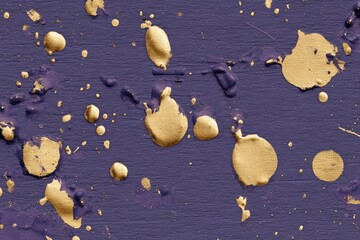 Abstract gold splatter on purple background