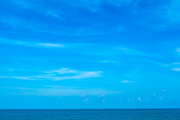 Nature of the ocean and blue sky Summer with sunshine, sandy beaches, clear blue waters sparkling...