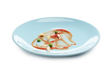 Dirty plate with tomato sauce, peas and bread crumbs isolated on white