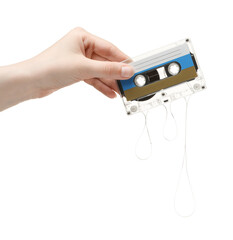 Woman holding audio cassette with blank label on white background, closeup