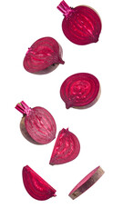 Fresh beetroots dropping and slicing through midair, revealing deep crimson interior against translucent backdrop