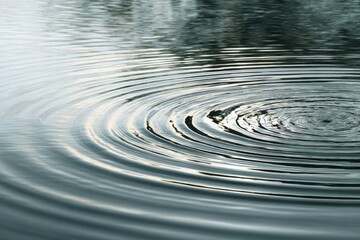 Fototapeta premium Serene water ripples, abstract nature background. Perfect for websites, print, and wellness projects.