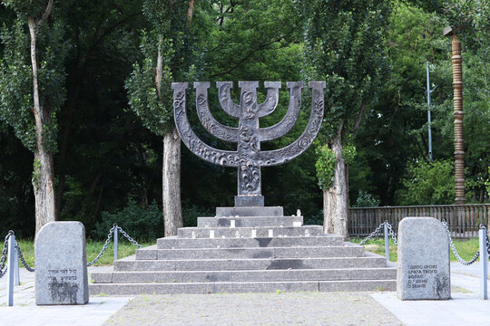 Kyiv, Ukraine - June 26, 2025: "Menorah" - a monument dedicated to the tragedy of the murder of peaceful Jewish citizens in Babi Yar during the Second World War. Bronze monument, seven-candlestick