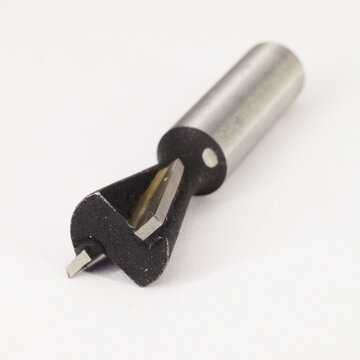 Cone milling wood cutter on white background - woodworking instrument