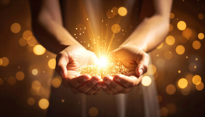 Hands holding a golden light as a sign of abundance and prosperity